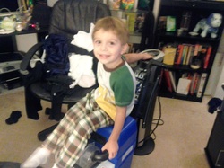 my son riding a carpet shampooer